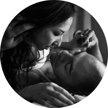 Woman surprising husband in bed