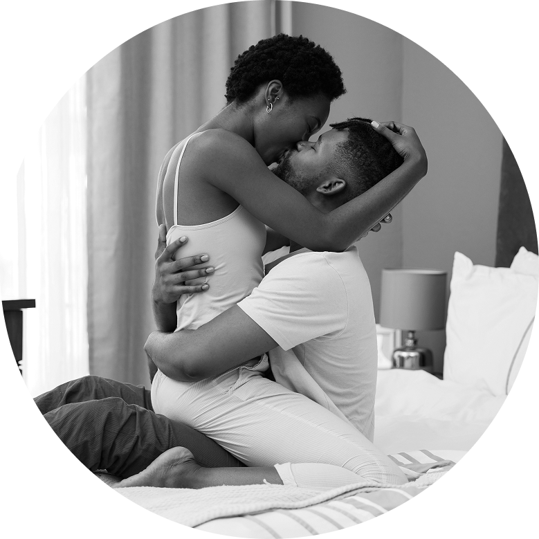 couple_on_date_night_kissing_in_bed